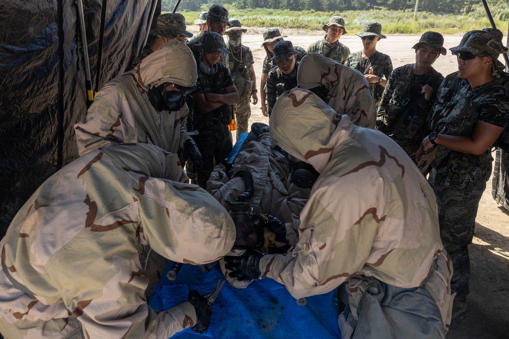 KMEP 23.3 | Marine CBRN Specialists conduct simulated decontamination line with ROK Marines