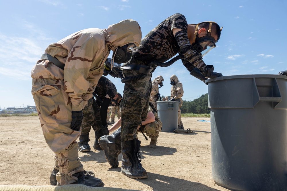 KMEP 23.3 | Marine CBRN Specialists conduct simulated decontamination line with ROK Marines