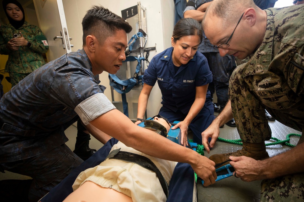 USCGC Munro and Royal Brunei Navy Participate in Medical Engagement for CARAT Brunei 2023