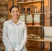 Shireen Muhaisen, owner of Bunni Coffee Roastery + Academy, showcases the shelves of coffee bags in her shop.