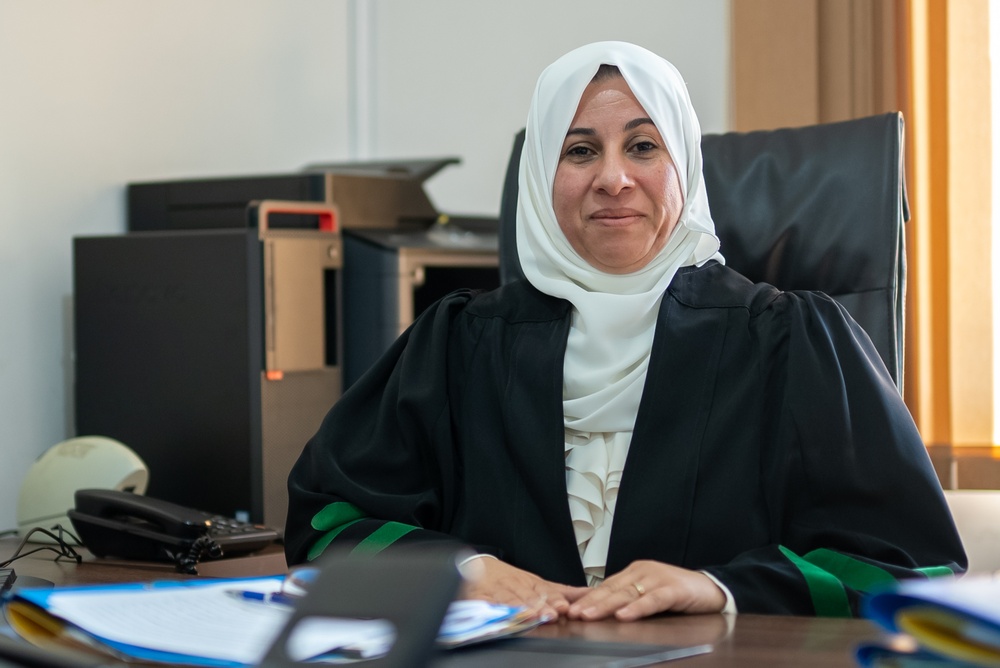 Judge Iman Qatarneh sits in her office at the Amman Juvenile Court of First Instance.