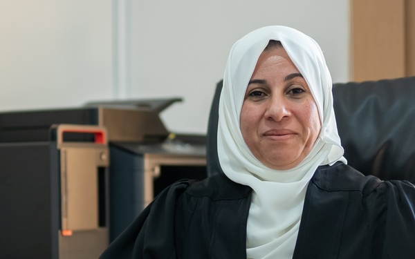 Judge Iman Qatarneh sits in her office at the Amman Juvenile Court of First Instance.