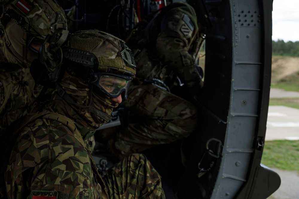 Task Force Knighthawk supports Latvian soldiers during aerial insertion, extraction training in Latvia