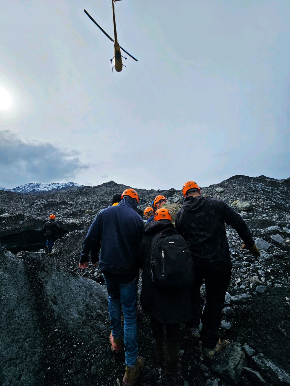 Airmen Treat, Carry Injured Hiker Across Alaskan Glacier on Day Off