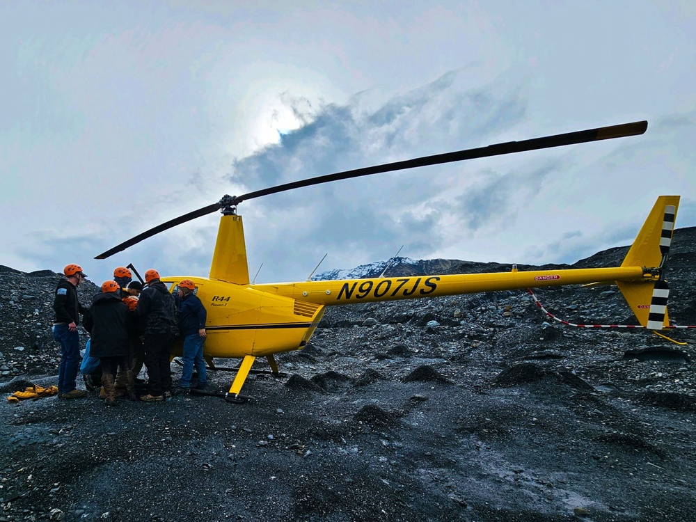 Airmen Treat, Carry Injured Hiker Across Alaskan Glacier on Day Off