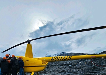 Airmen Treat, Carry Injured Hiker Across Alaskan Glacier on Day Off