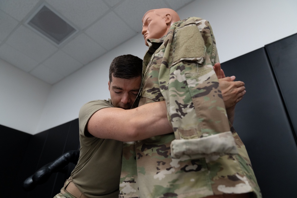 MacDill aviators learn combatives in SERE course