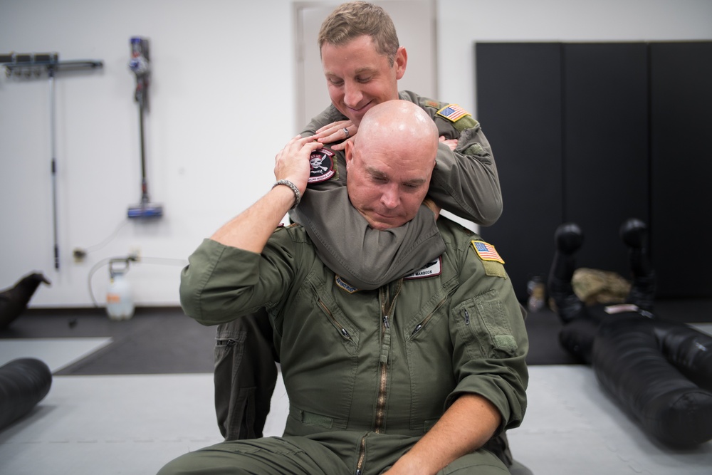 MacDill aviators learn combatives in SERE course