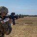 Spc. Peter Martin fires an M4 rifle during training at Fort