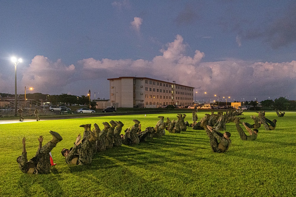 U.S. Marines conduct morning physical training for a Martial Arts Instructor course