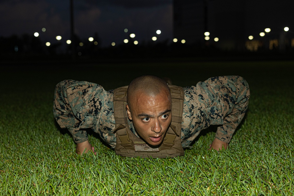 U.S. Marines conduct morning physical training for a Martial Arts Instructor course