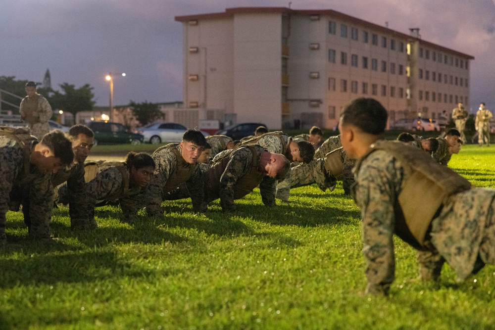 U.S. Marines conduct morning physical training for a Martial Arts Instructor course