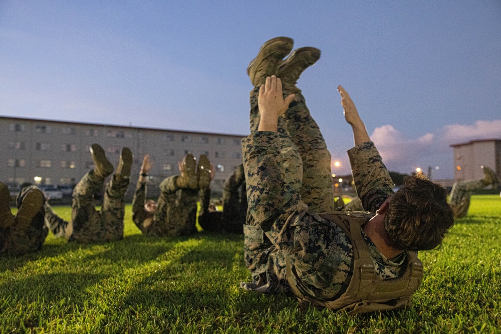 U.S. Marines conduct morning physical training for a Martial Arts Instructor course