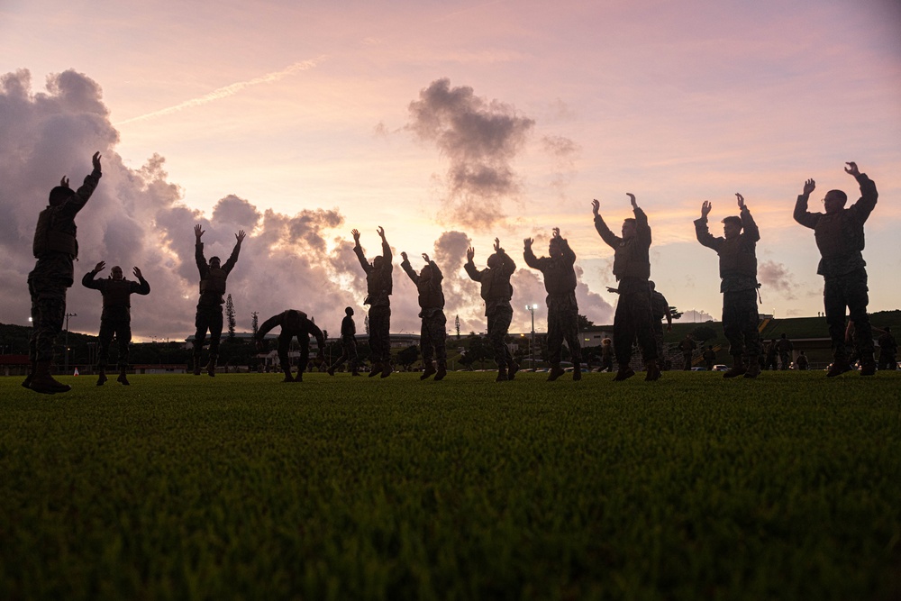 U.S. Marines conduct morning physical training for a Martial Arts Instructor course