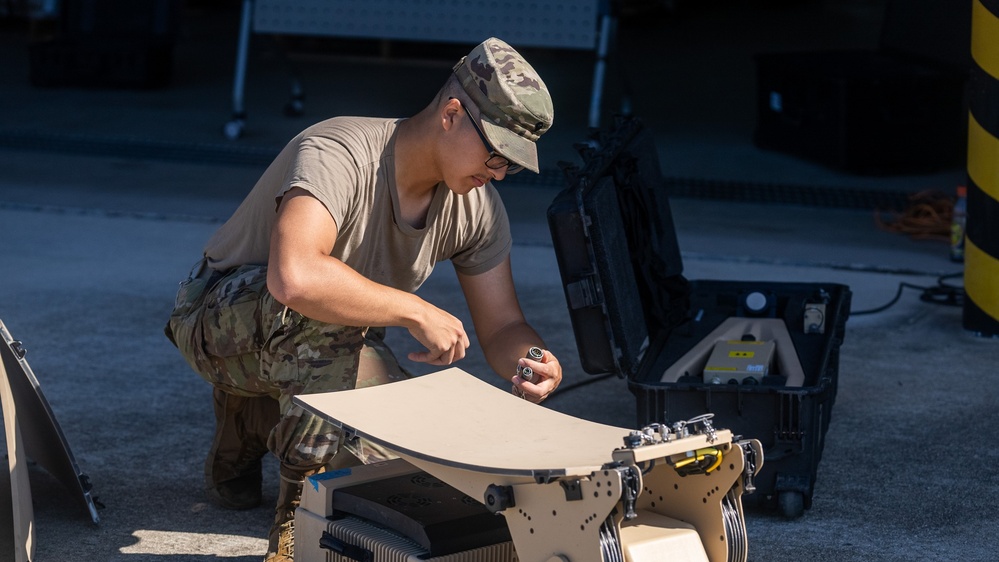 304th Expeditionary Signal Battalion Enhanced conducting maintenance.