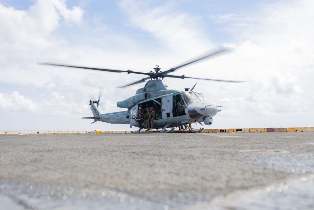 U.S. Marines Conduct Fast Rope Aboard The USS Greenbay