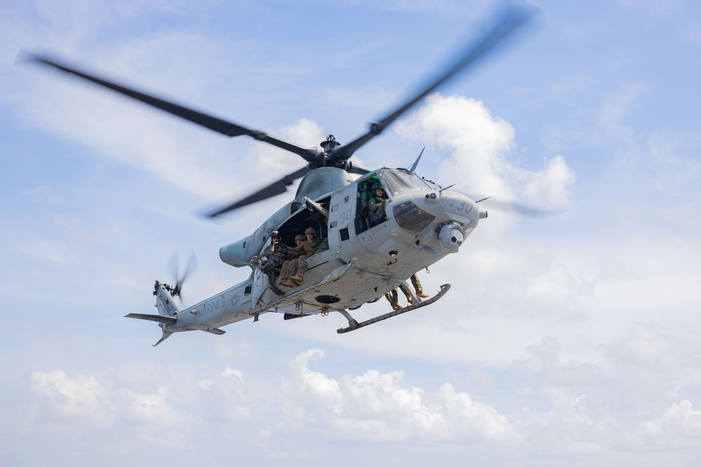 U.S. Marines Conduct Fast Rope Aboard The USS Greenbay