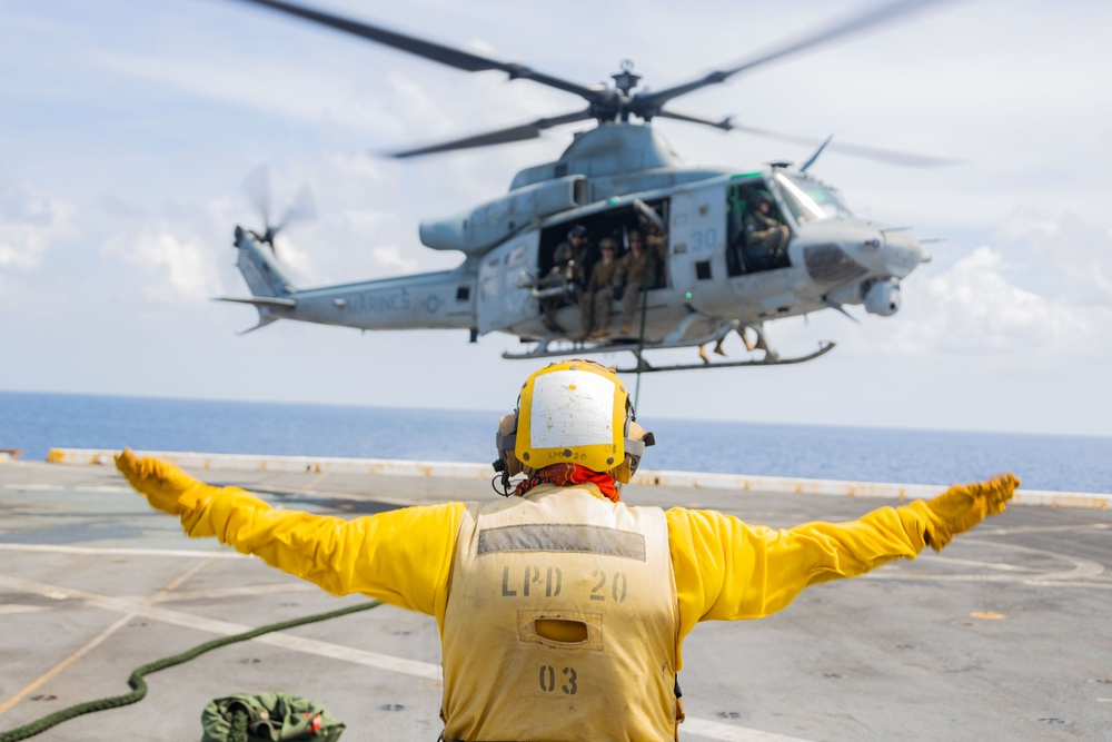 U.S. Marines Conduct Fast Rope Aboard The USS Greenbay