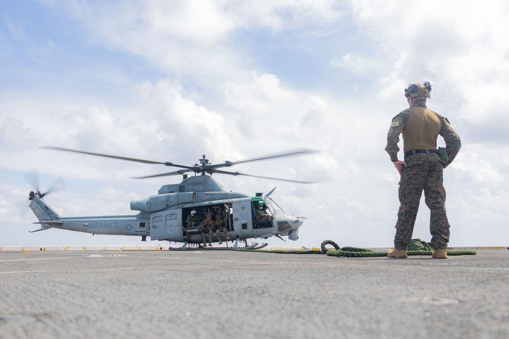 U.S. Marines Conduct Fast Rope Aboard The USS Greenbay