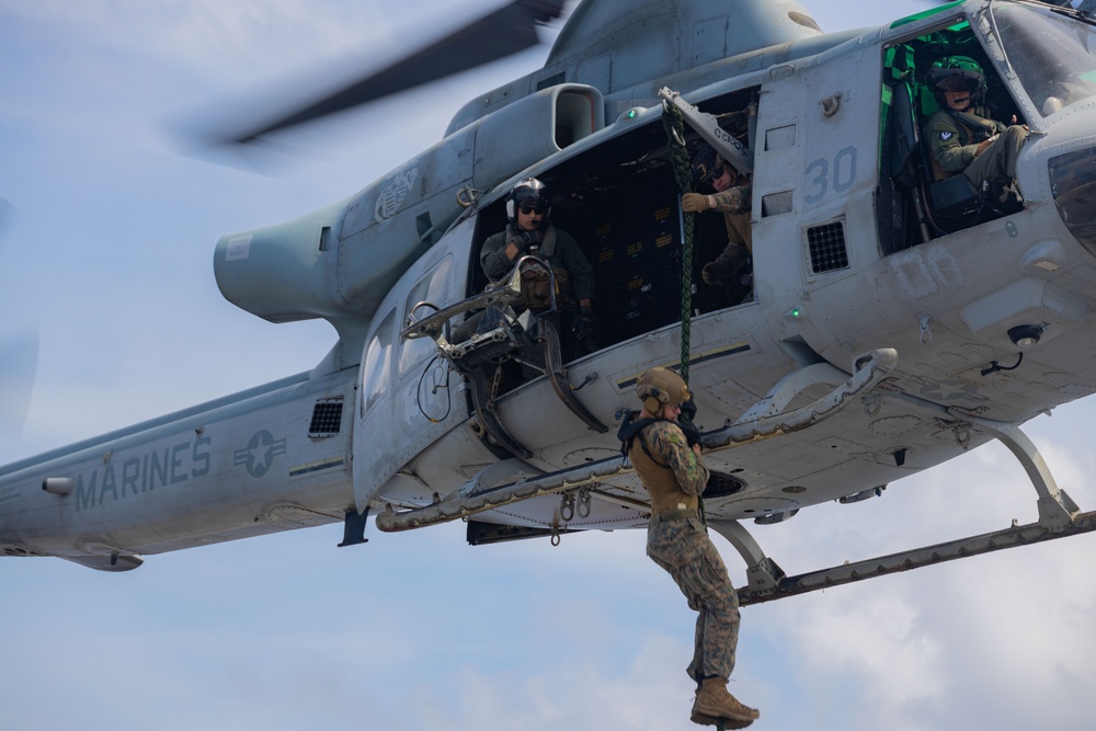 U.S. Marines Conduct Fast Rope Aboard The USS Greenbay