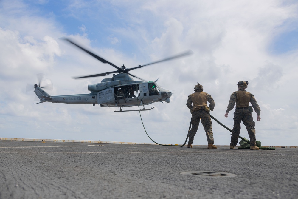 U.S. Marines Conduct Fast Rope Aboard The USS Greenbay