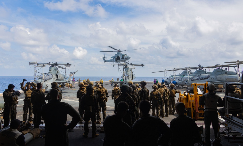 U.S. Marines Conduct Fast Rope Aboard The USS Greenbay