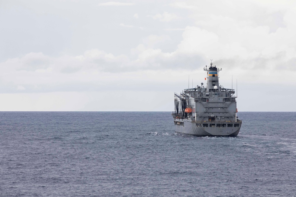 USS Ralph Johnson and His Majesty’s Canadian Ship (HMCS) Ottawa (FFH 341) conduct a replenishment-at-sea with the USNS Yukon.