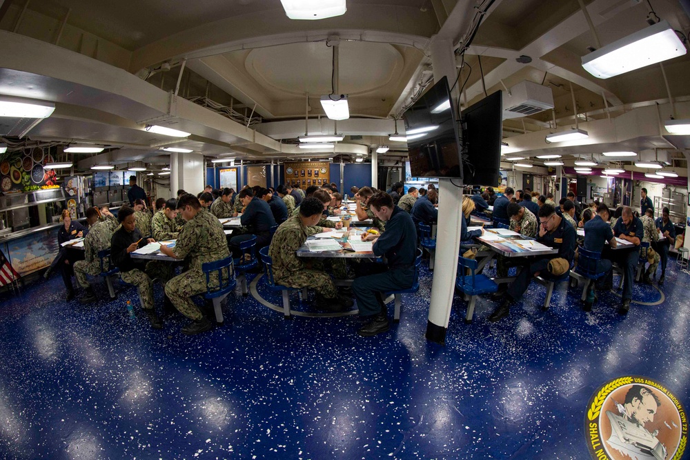 Abraham Lincoln Sailors take advancement exam