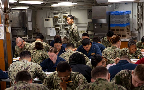 Abraham Lincoln Sailors take advancement exam