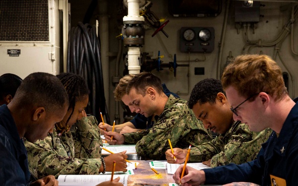 Abraham Lincoln Sailors take advancement exam