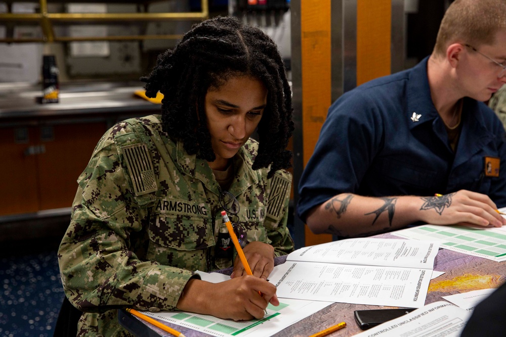 Abraham Lincoln Sailors take advancement exam