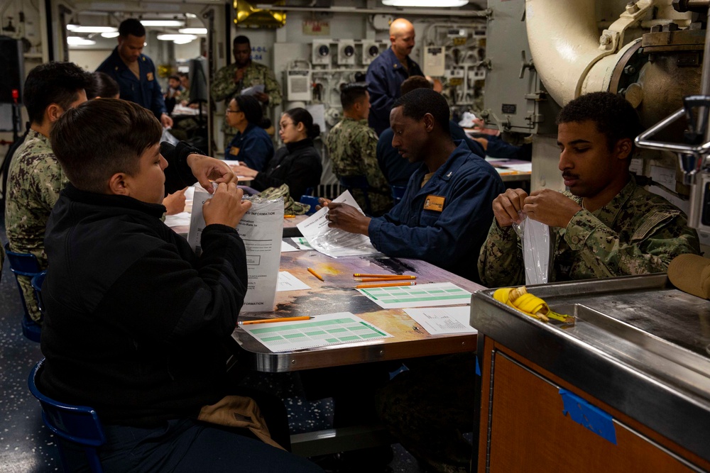 Abraham Lincoln Sailors take advancement exam