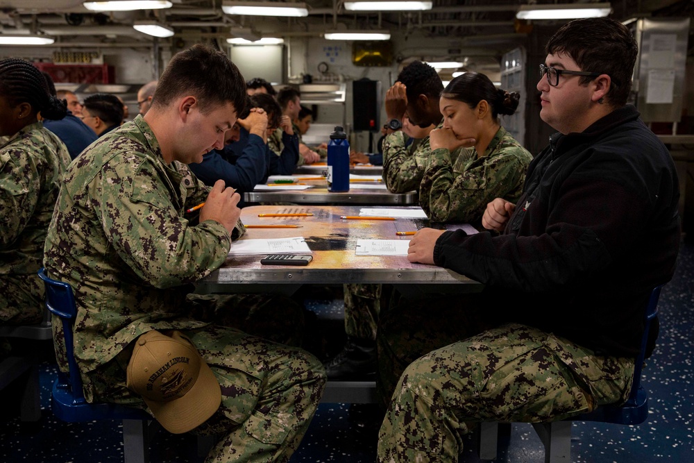 Abraham Lincoln Sailors take advancement exam