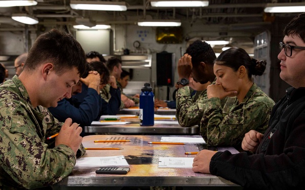 Abraham Lincoln Sailors take advancement exam