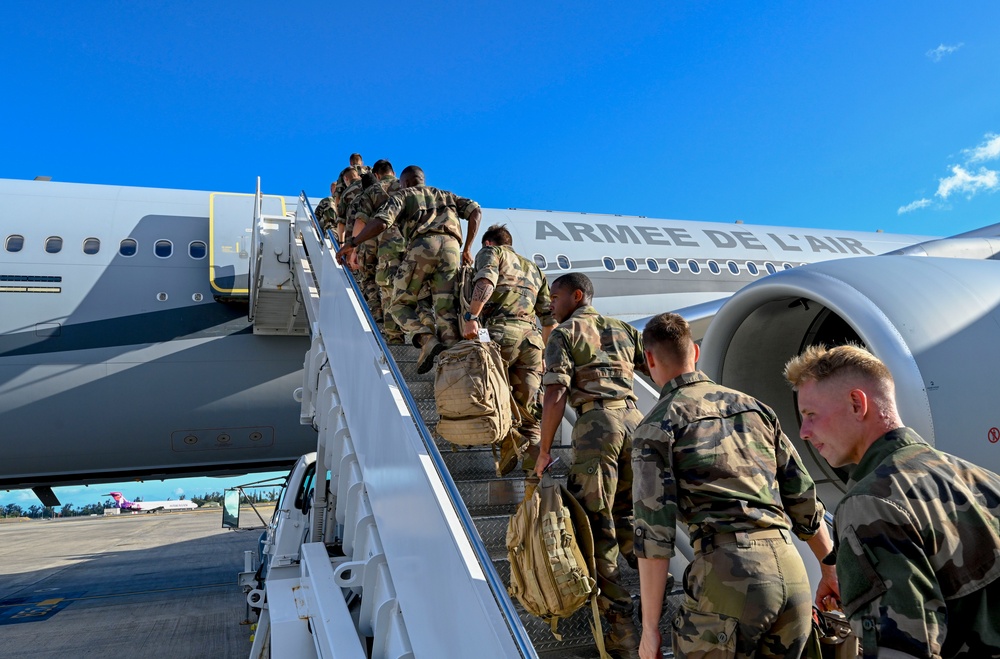 U.S. Marines and French soldiers on Hawaii flight line