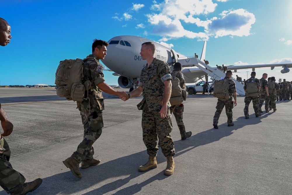 U.S. Marines and French soldiers on Hawaii flight line