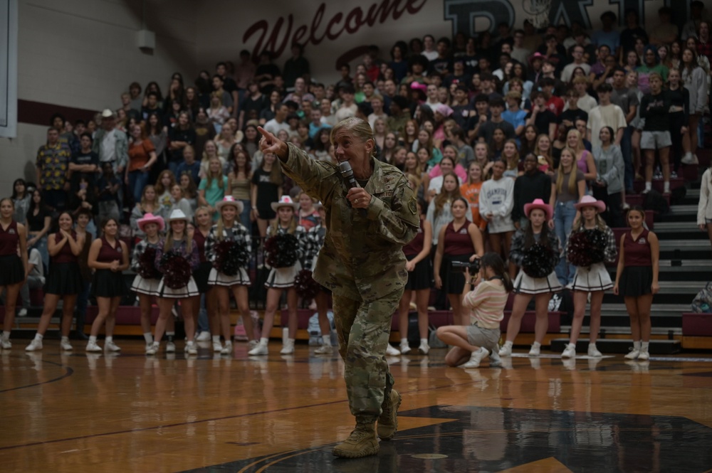 Airmen fly over and join FWB, Navarre Friday night football games