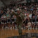 Airmen fly over and join FWB, Navarre Friday night football games