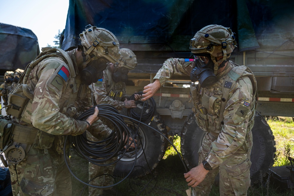 Multinational soldiers train against chemical attacks at Saber Junction 23