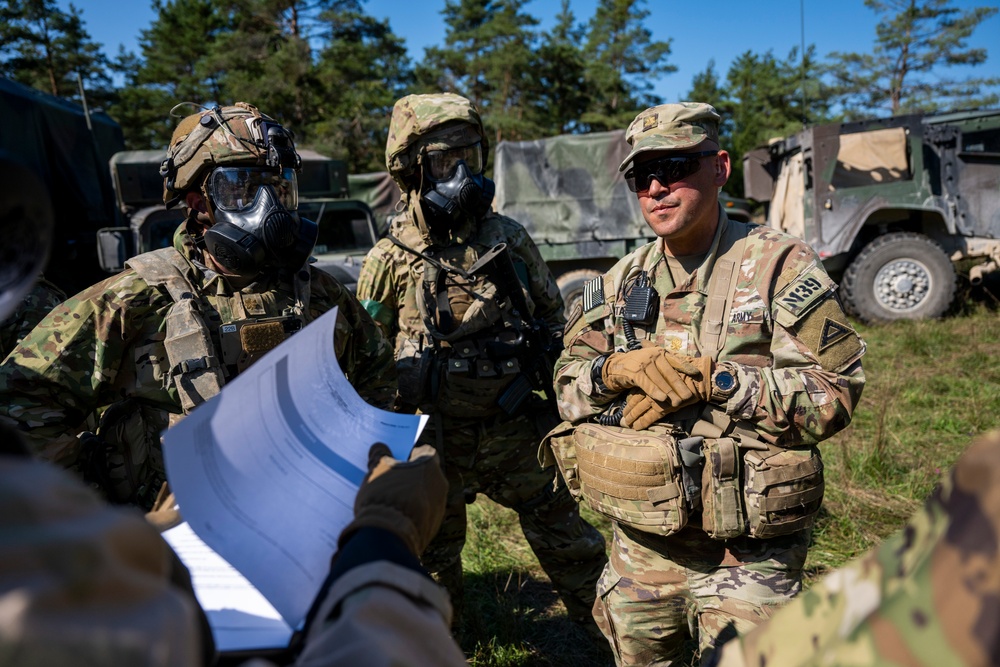 Multinational soldiers train against chemical attacks at Saber Junction 23