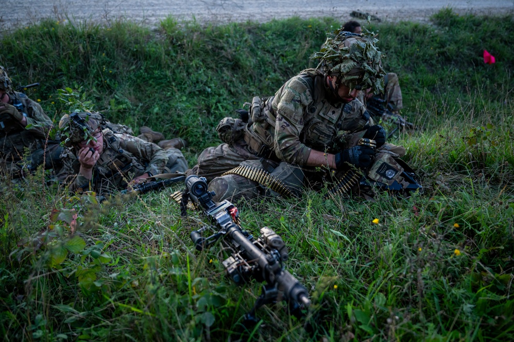 U.S. Army Soldiers engage in a gunfire battle at Saber Junction 23