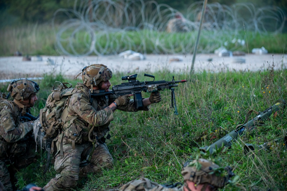 U.S. Army Soldiers engage in a gunfire battle at Saber Junction 23