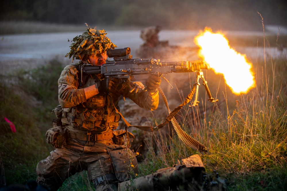 U.S. Army Soldiers engage in a gunfire battle at Saber Junction 23