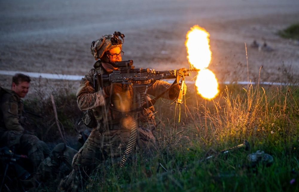 U.S. Army Soldiers engage in a gunfire battle at Saber Junction 23