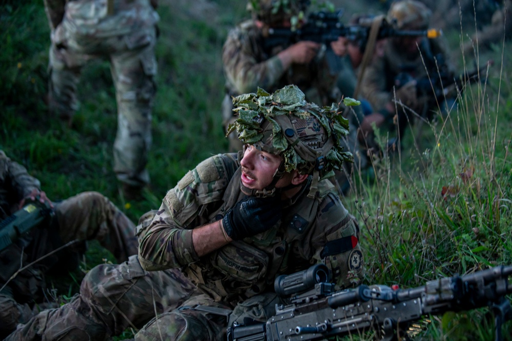 U.S. Army Soldiers engage in a gunfire battle at Saber Junction 23