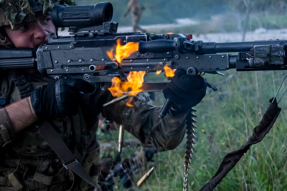 U.S. Army Soldiers engage in a gunfire battle at Saber Junction 23