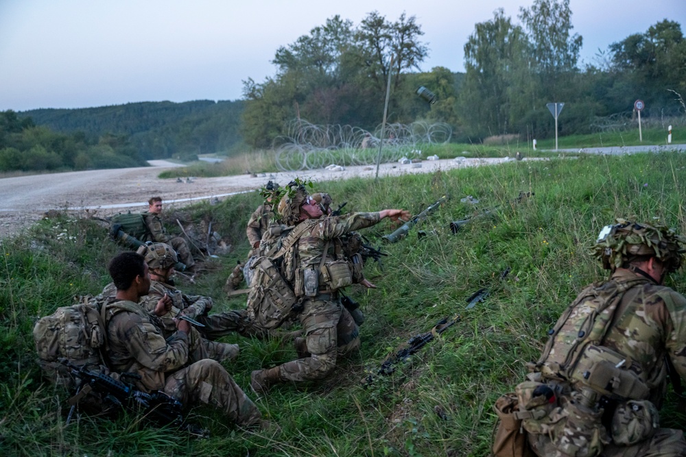 U.S. Army Soldiers engage in a gunfire battle at Saber Junction 23