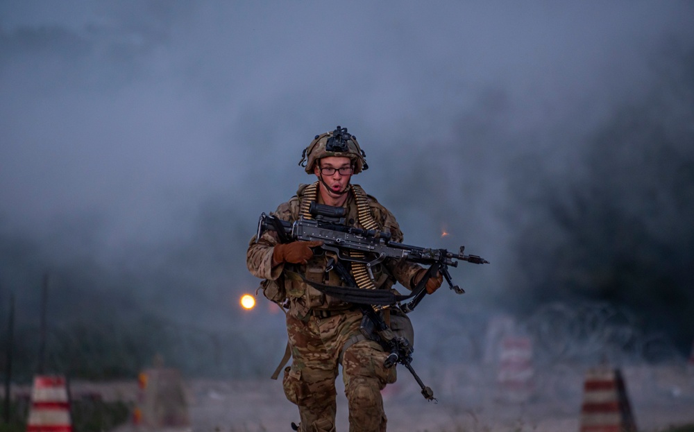 U.S. Army Soldiers engage in a gunfire battle at Saber Junction 23