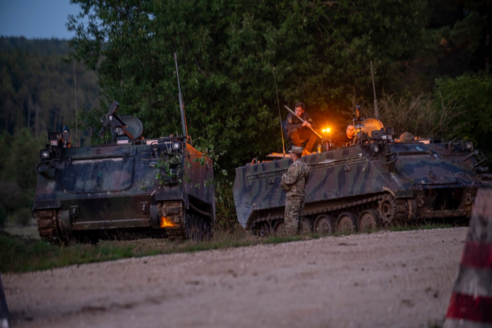 U.S. Army Soldiers engage in a gunfire battle at Saber Junction 23