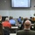 Commander, NSWC, briefs APEX Attendees